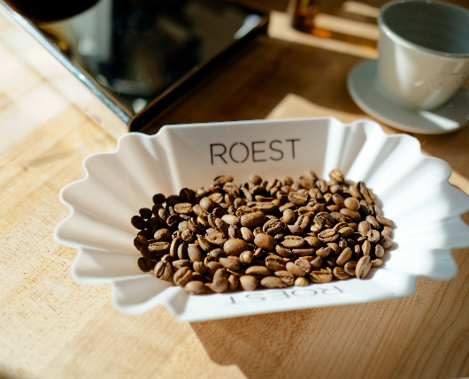 a bowl of roasted coffee